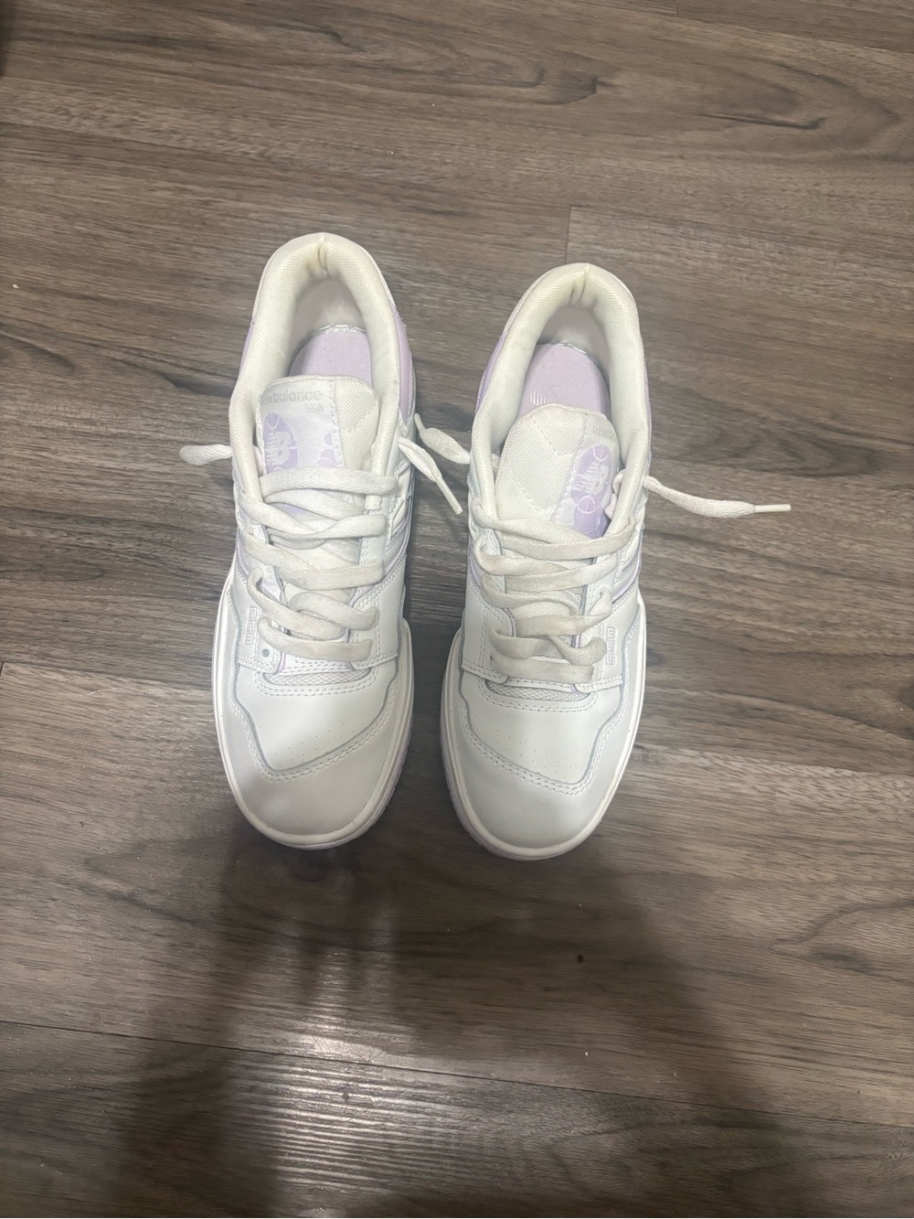 New Balance White Sneakers with Lilac Tongue Detail